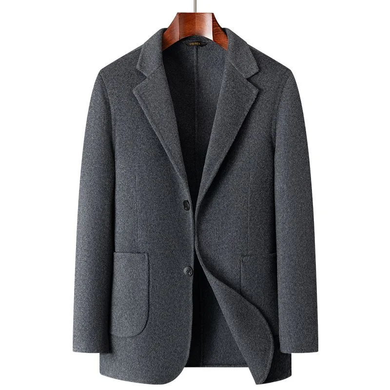 Double-Faced Wool Blazer — A double-faced wool blazer in dark grey on a wooden hanger, with notch lapels and patch pockets