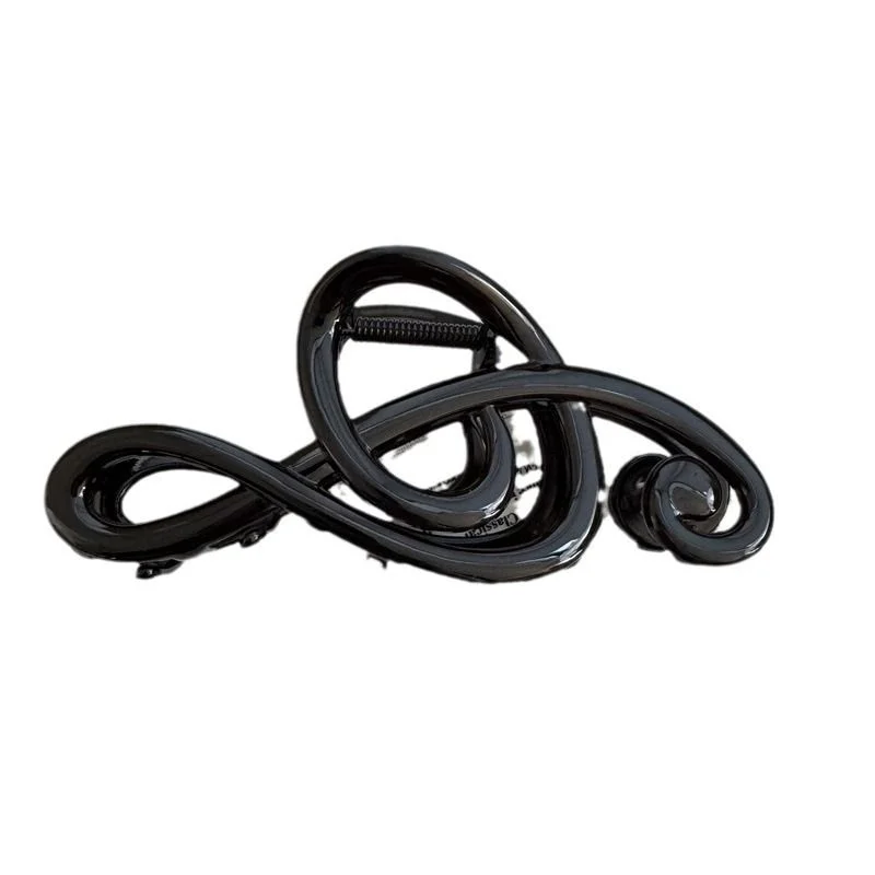 Musical-Note Claw Clip — Large claw hair clip shaped as a treble clef and musical notes