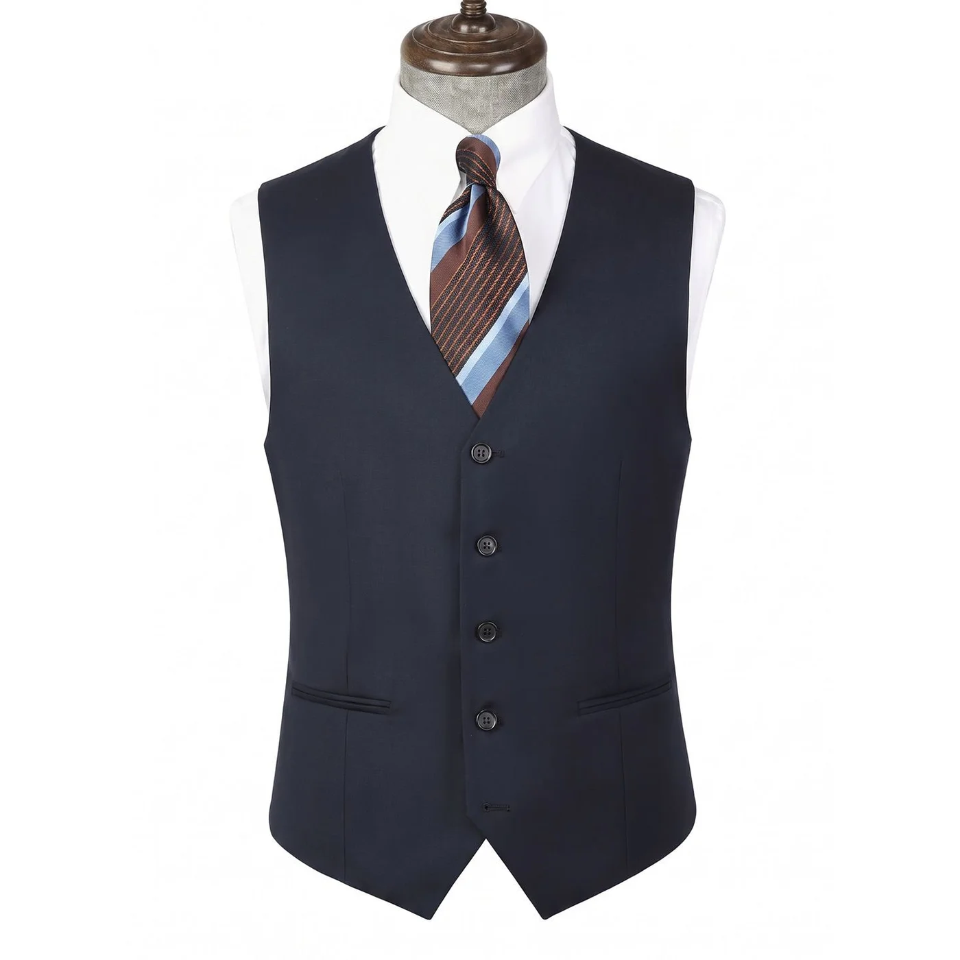 Wool-Blend Suit Waistcoat — A navy five-button suit waistcoat in a wool blend, shown on a tailor’s dummy over a white shirt and tie