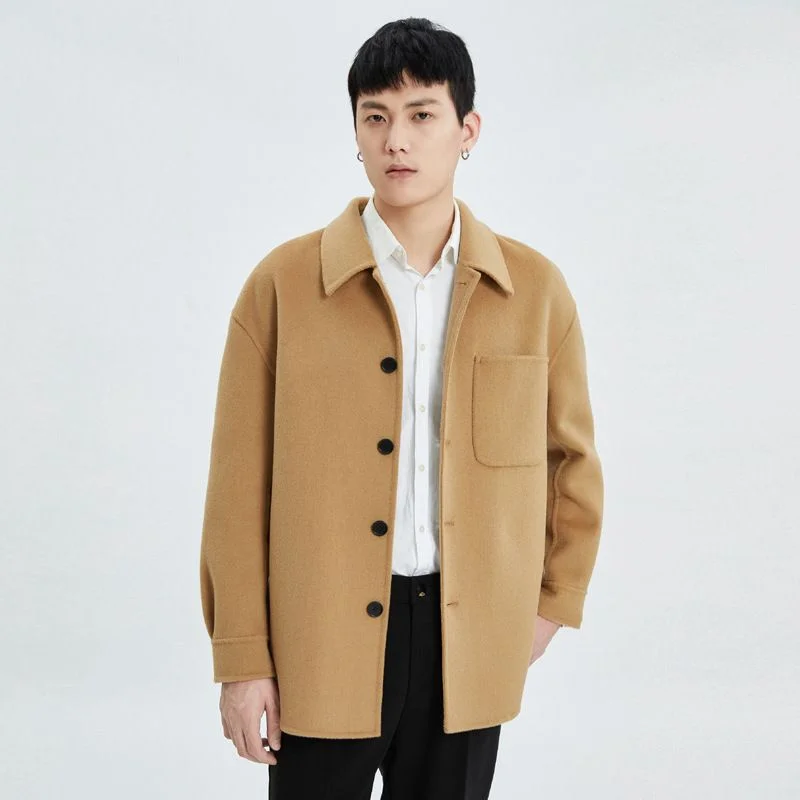 Wool Shirt Jacket — A short wool shirt jacket with a camp collar and a patch chest pocket, shown in camel and black